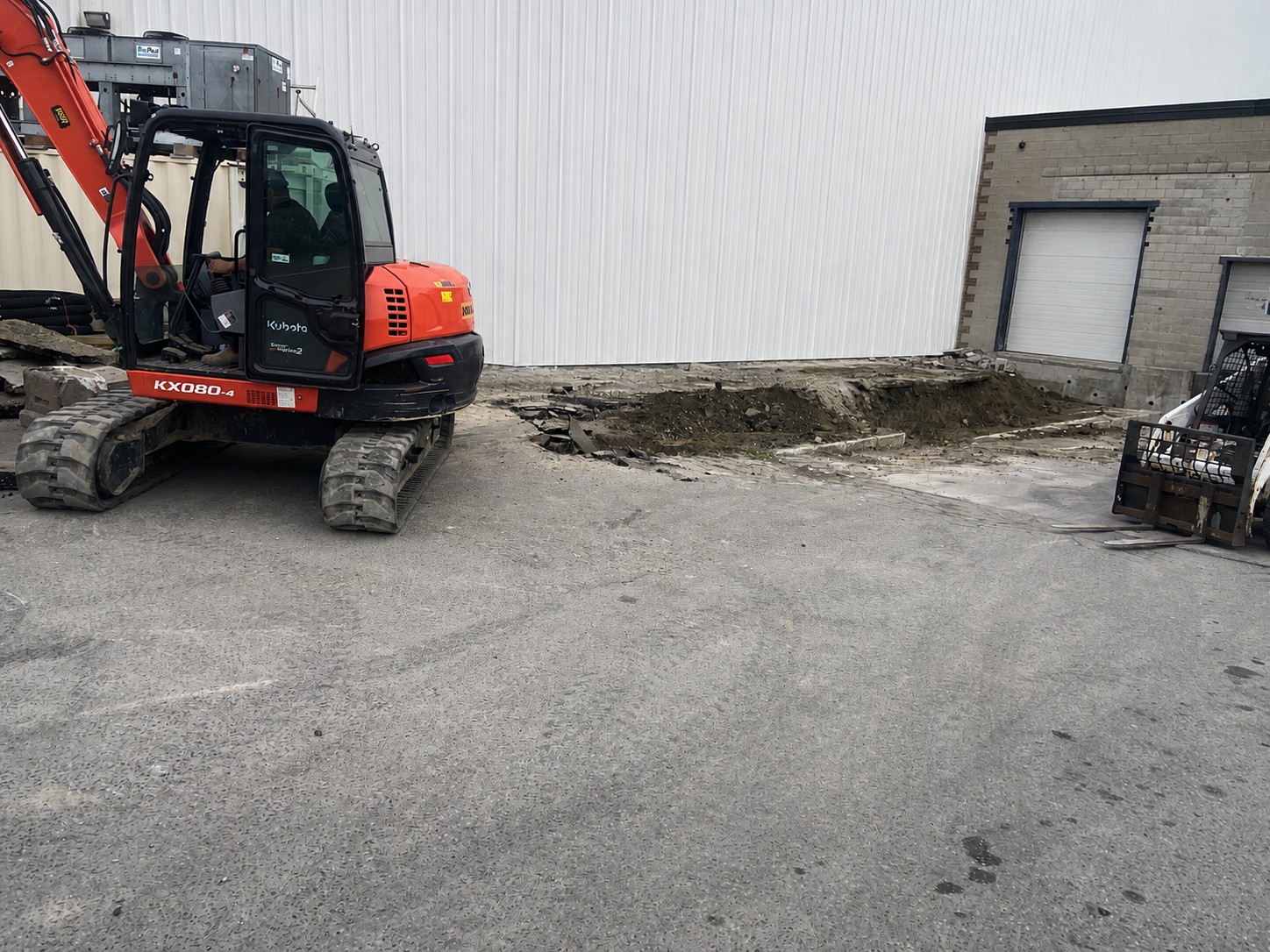 Excavator preparing a commercial site